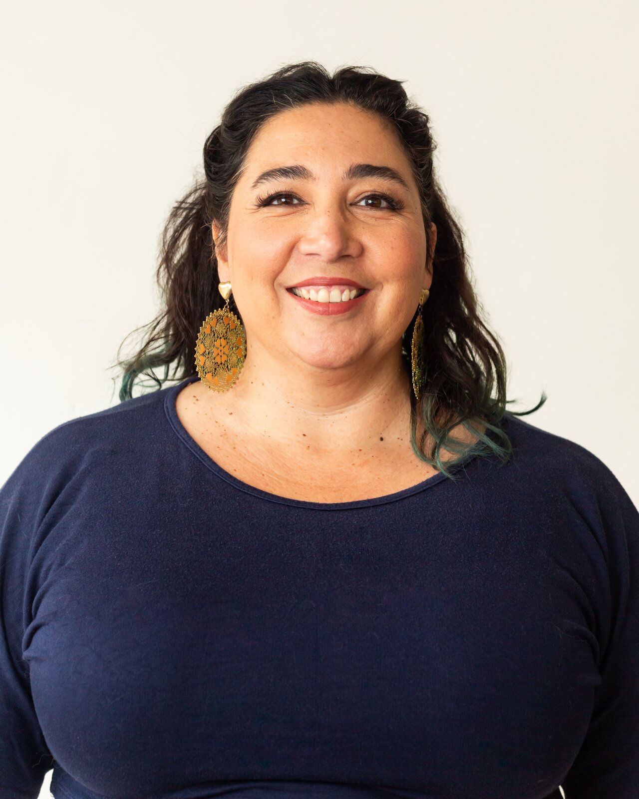Alexandria smiling in a portrait
